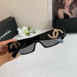 Chanel Women's Black and Gold Sunglasses